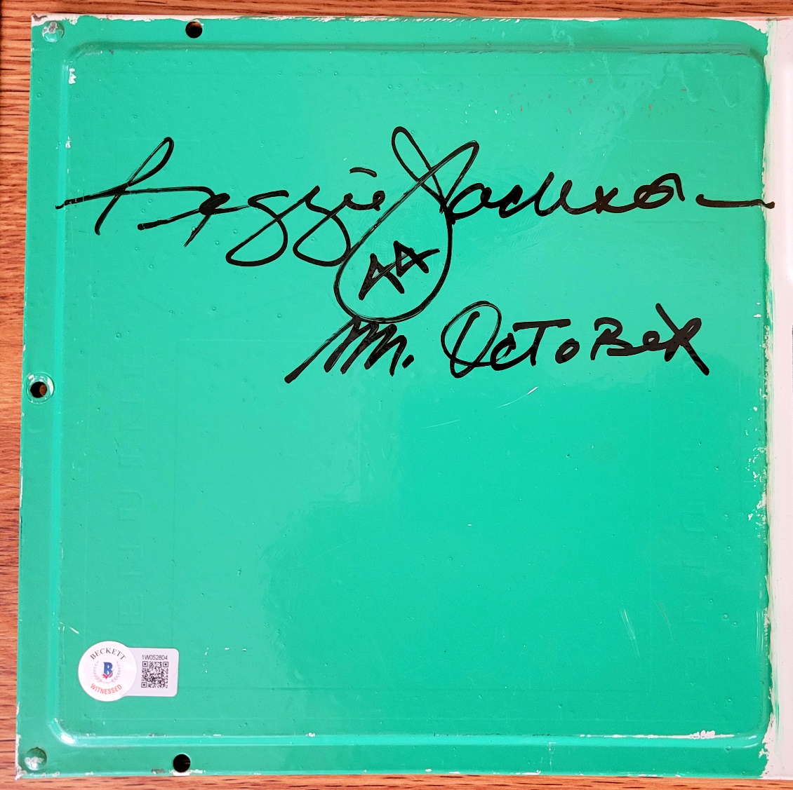 ReggieSignedComVisitorsClubhouseNameplate--8-2024IV.jpg